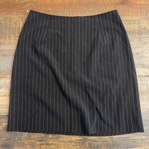 Black bodycon mini skirt with pink stripes